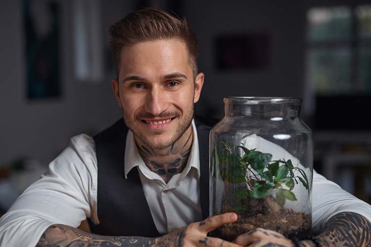 Our tem member Maddox with a terrarium.